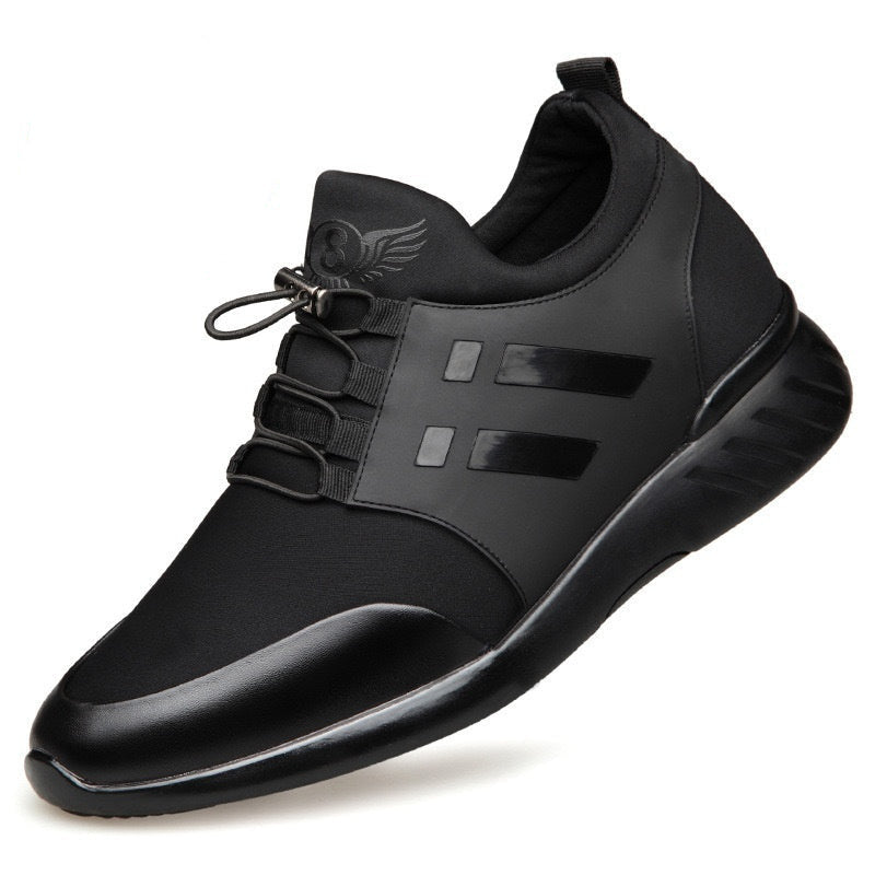 Black shoe with 8cm internal height increase label on a white background