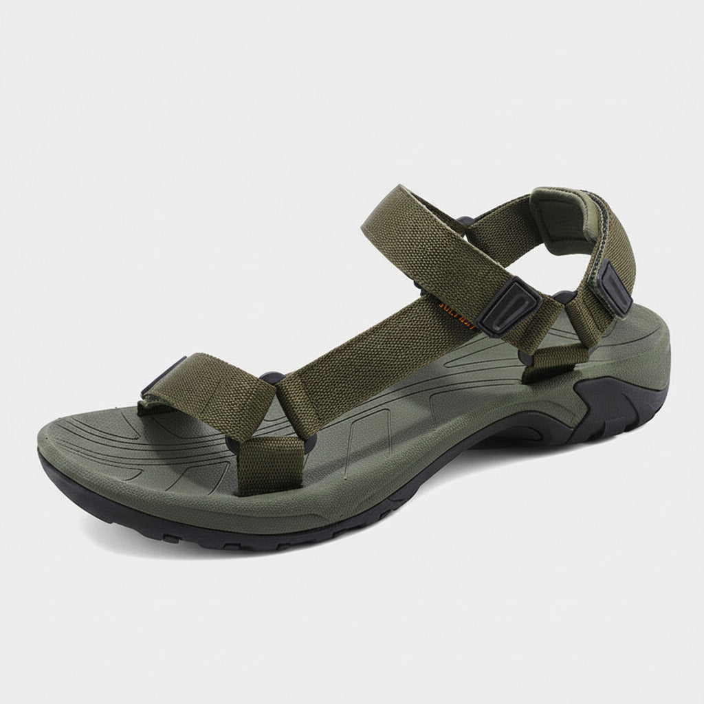 Green sandal with multiple straps on a white background