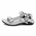 Gray sandal with multiple straps on a white background