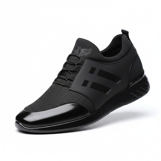 Black dress shoes with a brand logo on a gray background