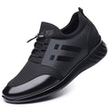 Black shoe with a 8CM internal height increase label on a white background