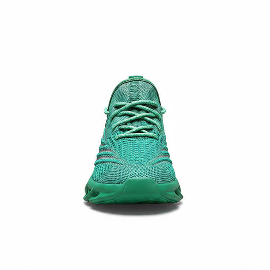 Green sneaker with unique sole design on a white background