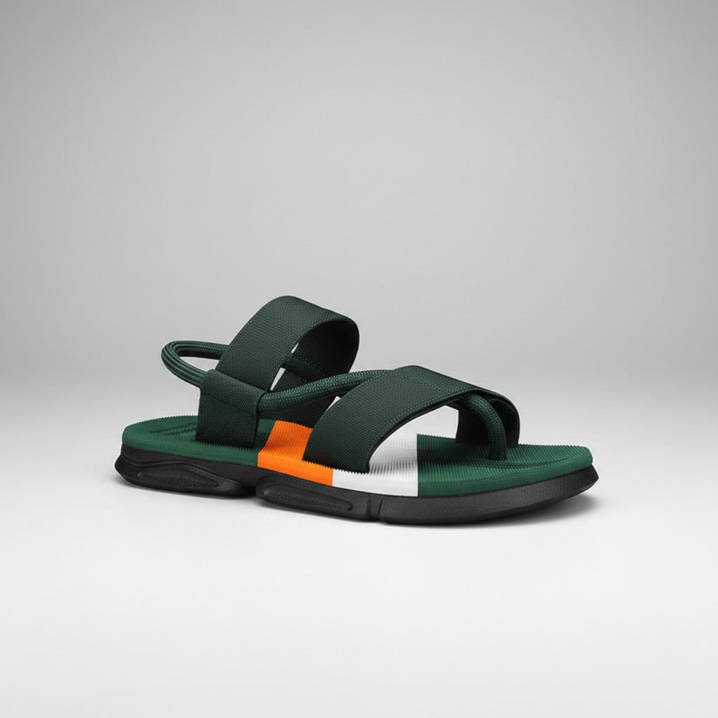 Green sandal with orange and white accents on a white background